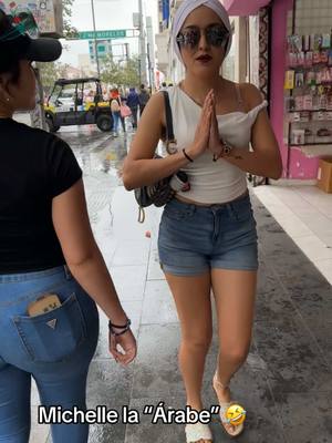 A post by @la_familia_alvarez_2 on TikTok caption: Caminando por la calle Morelos en Monterrey, como llovía Michelle se puso esa gorra y parecía Árabe! #🤪 #jajaja #loquilla #🤣🤣🤣 
