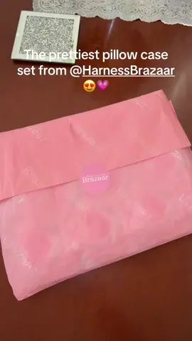 A post by @dollyywellsx on TikTok caption: What a stunning order😍 thank you so much for my pillow case set @Harness Brazaar  💗💗💗#pillowcases #haul #SmallBusiness #pink #bedding #stayathomemum 