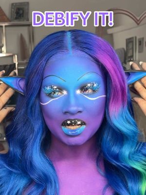 A post by @beatsbydeb on TikTok caption: waaaittt such subtle additions made a whole new look💜 MAJOR DEETS⤵️ Contacts: Obsidian Grey & Violet @PinkyParadise  Fat Oil Gloss @NYX Professional Makeup  Liners @Glisten Cosmetics LTD  Bling Loose Highlighter “Ice Me Out” @BeatsByDeb Cosmetics 