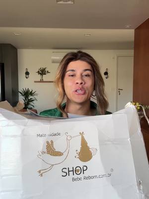 A post by @ on TikTok caption: Unboxing da minha #BebeReborn 😂🤍🫶🏼