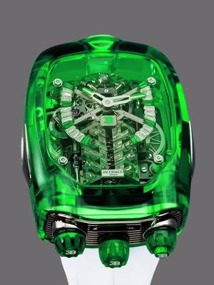 A post by @jacobandco on TikTok caption: A masterpiece of innovation and design. The Bugatti Chiron Tourbillon Green Sapphire Crystal showcases a fusion of cutting-edge technology and unmatched craftsmanship. A tribute to performance, luxury, and vision. This is where the art of watchmaking meets the spirit of hypercars.Crafted for those who demand the exceptional. #InspiredByTheImpossible #jacobandco #bugatti