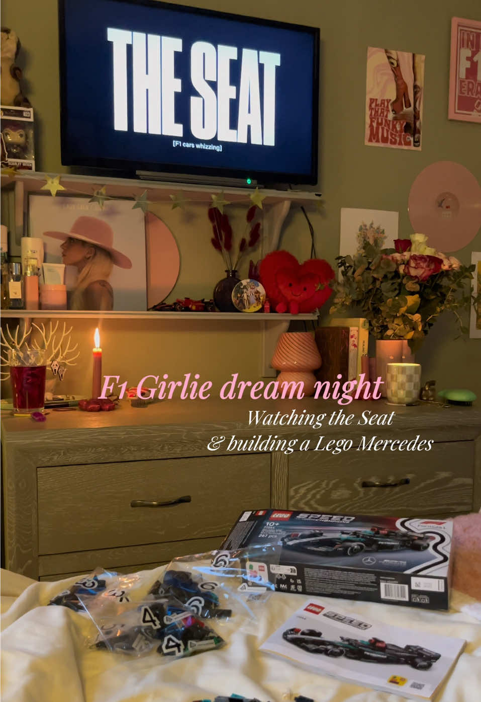 A post by @ on TikTok caption: My kind of heaven ♥️💫🏎️💋 #F1 #f1girlie #formulaone #formula1 #mercedes #mercedesf1  #kimiantonelli #georgerussell #lewishamilton #theseat #netflix #lego #legof1 @Formula 1 @Netflix @Mercedes-AMG F1 