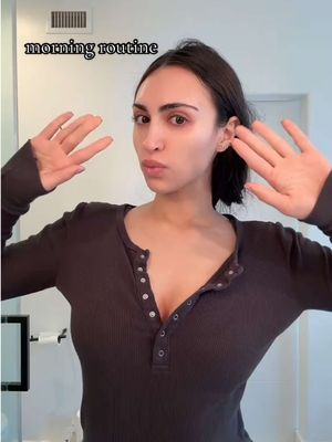 A post by @dariakateb on TikTok caption: morning self care routine 🤍🥰 @Sheila Stotts Luxury Tools brush @Scünci claw clip @epionce cleanser & eye serum @SkinCeuticals LHA toner @Control Corrective Skincare SPF @Alo Yoga lip balm @Caudalie beauty elixir #morningroutine #morningskincare #morningskincareroutine #spendthemorningwithme 