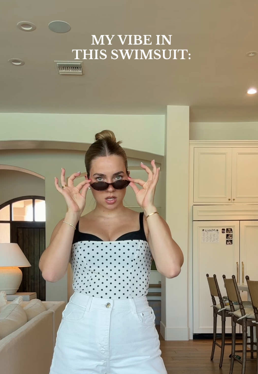 A post by @emiliekiser on TikTok caption: Trigg was obsessed with this sound hahahah it’s giving ✨parent trap✨ #dayinmylife #poolday #ootd #summervibes #parenttrap #meridethgrey #viral #trending #fyp #cleangirl #cleangirlaesthetic #reformation #momsoftiktok #youngmom #momoftwo #postpartum 