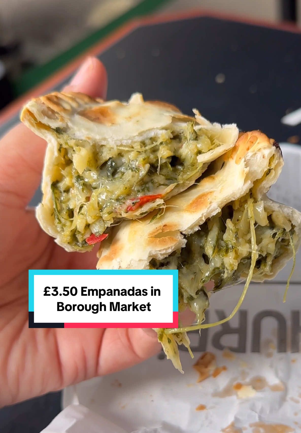 A post by @kauscooks on TikTok caption: Empanadas for £3.50 each or 3 for £9.75!! From Portena in Borough Market, London #cheapeats #londonfood #boroughmarket 