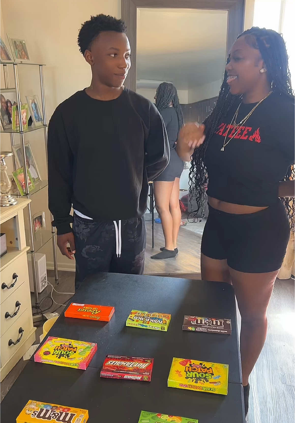 A post by @niyawiyaaa18 on TikTok caption: I had to do this with my lil brother 😂 he such a sweet mouth ! Then we got my momma inna back talking shii😂😂😂😂  @ً  #viral #foryoupage #foryoupage #viral #lilbrother #niya #game #candygame #foryoupage❤️❤️ 
