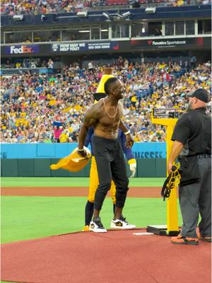 A post by @thesavbananas on TikTok caption: Titan’s LEGEND Jevon Kearse came out to help us to compete with @Jake Lialios and @The Party Animals  #savannahbananas #titans #nflnews #baseballmom #partyanimals #tiktokdance 