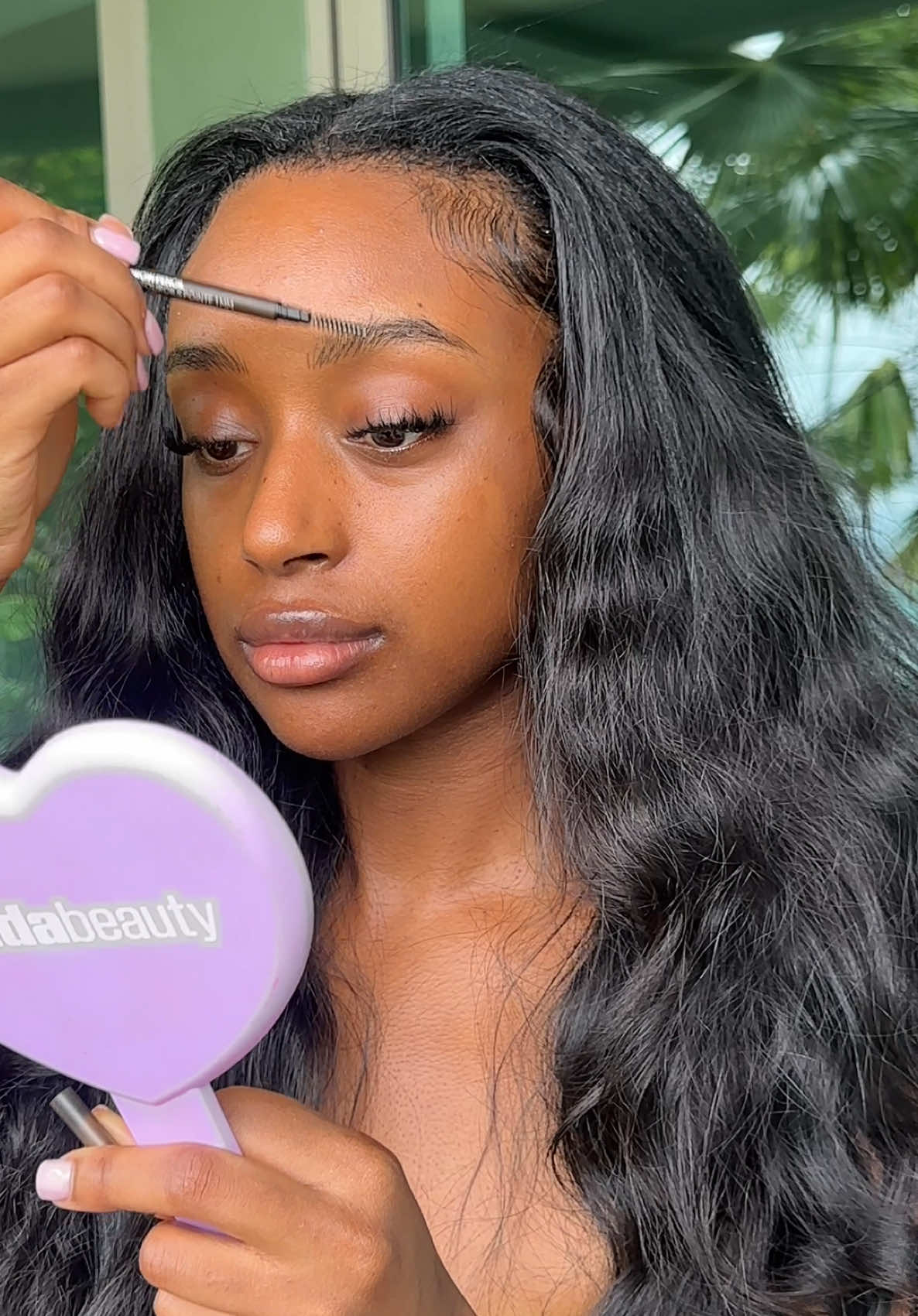 A post by @fatimabahxo on TikTok caption: vacay lightweight beat, it’s so humid here and this @ONE SIZE BEAUTY primer has been getting me through!