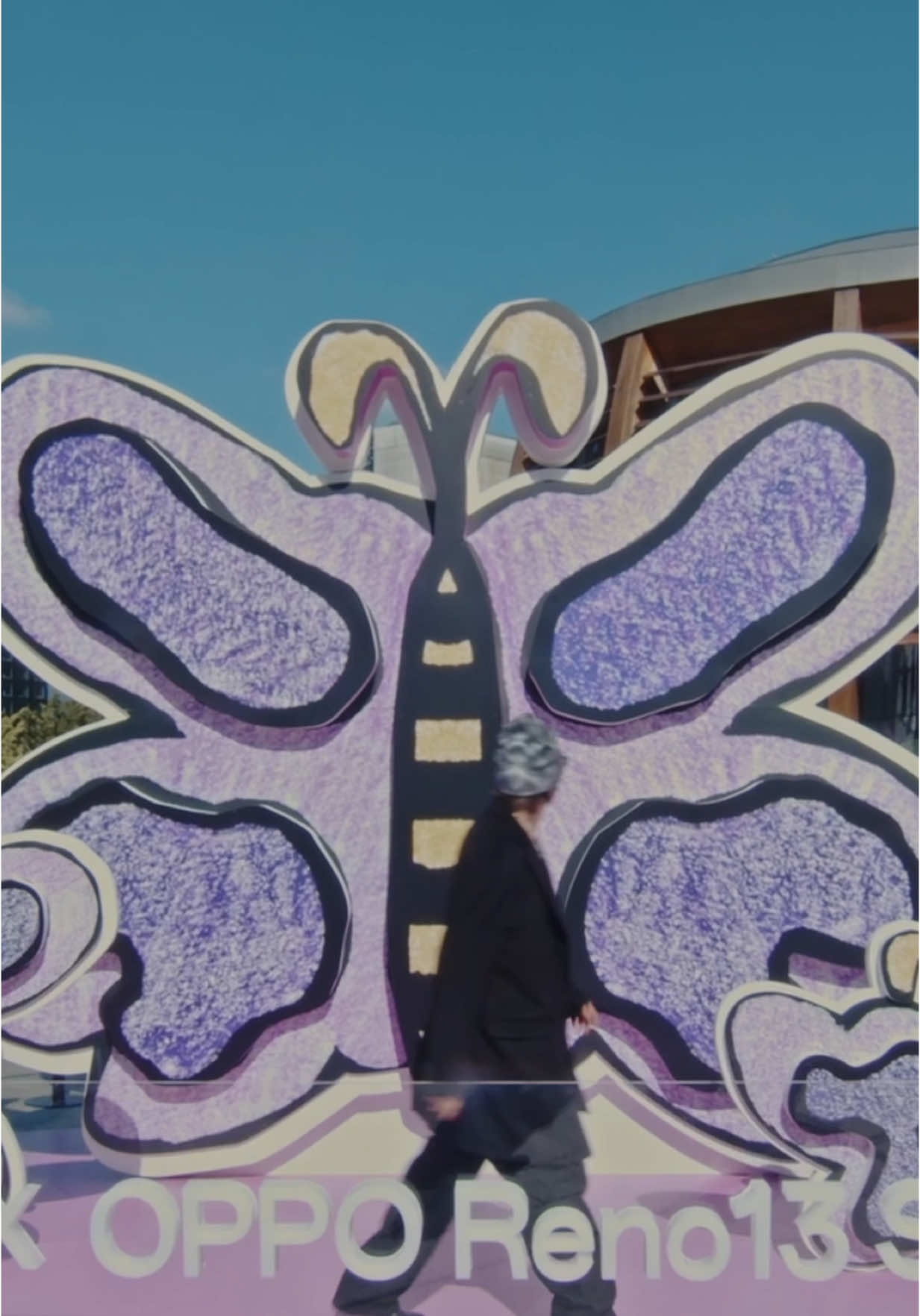 A post by @davidevavalaa on TikTok caption: Celebrating the launch of the phone case inspired by the OPPO Reno13 Series. Catch the #ButterflyEvolution live at Milan’s Piazza Gae Aulenti. @OPPO Italia  @Portanuova Milano  #OPPOReno13Series #ButterflyEvolution #ButterflyVibe #portanuovamilano adv