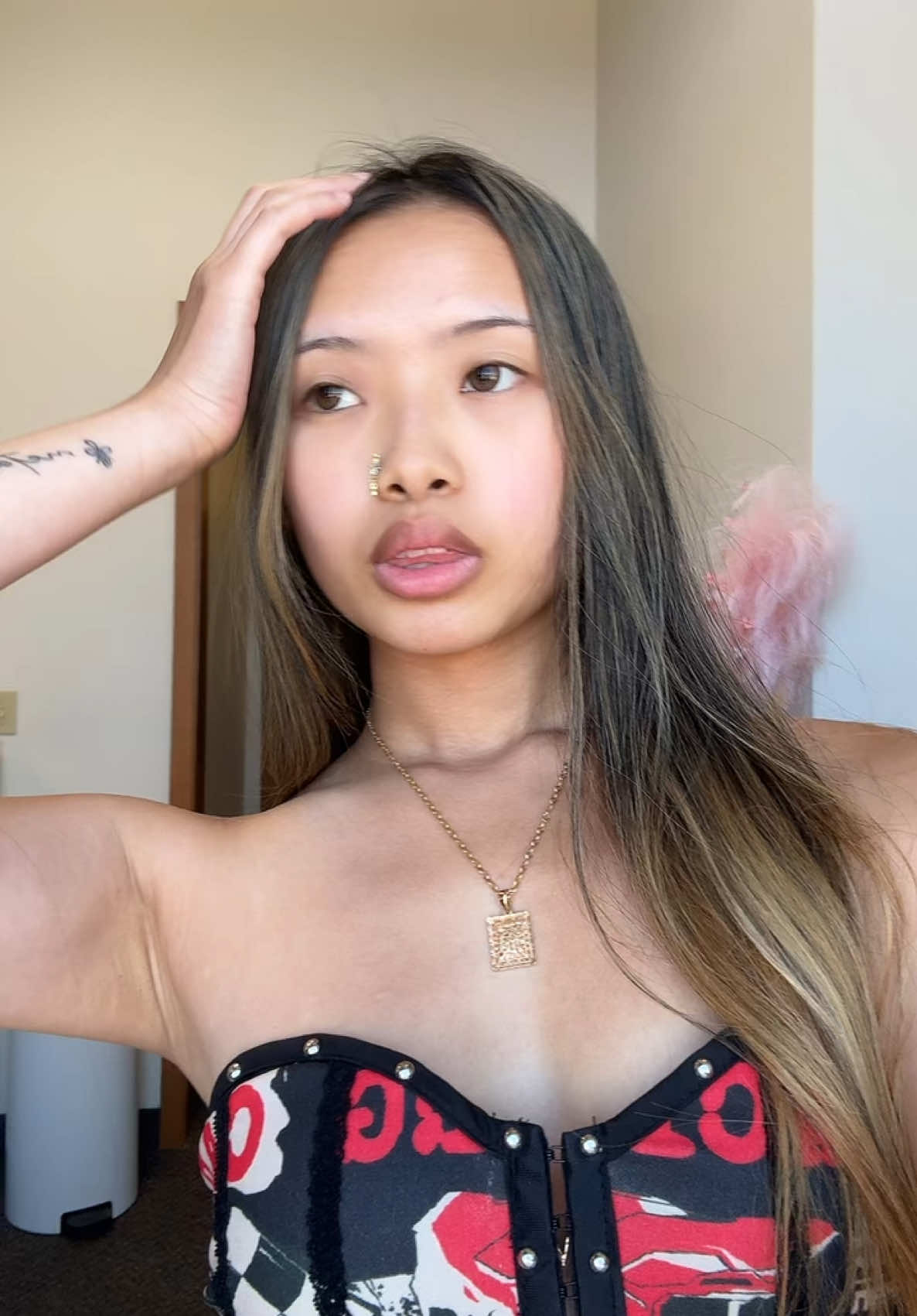 A post by @tianaaaeel on TikTok caption: photoshoot ready 💕 #photoshoot #asian #hmong #socal #wi #fyp #trending #viral 