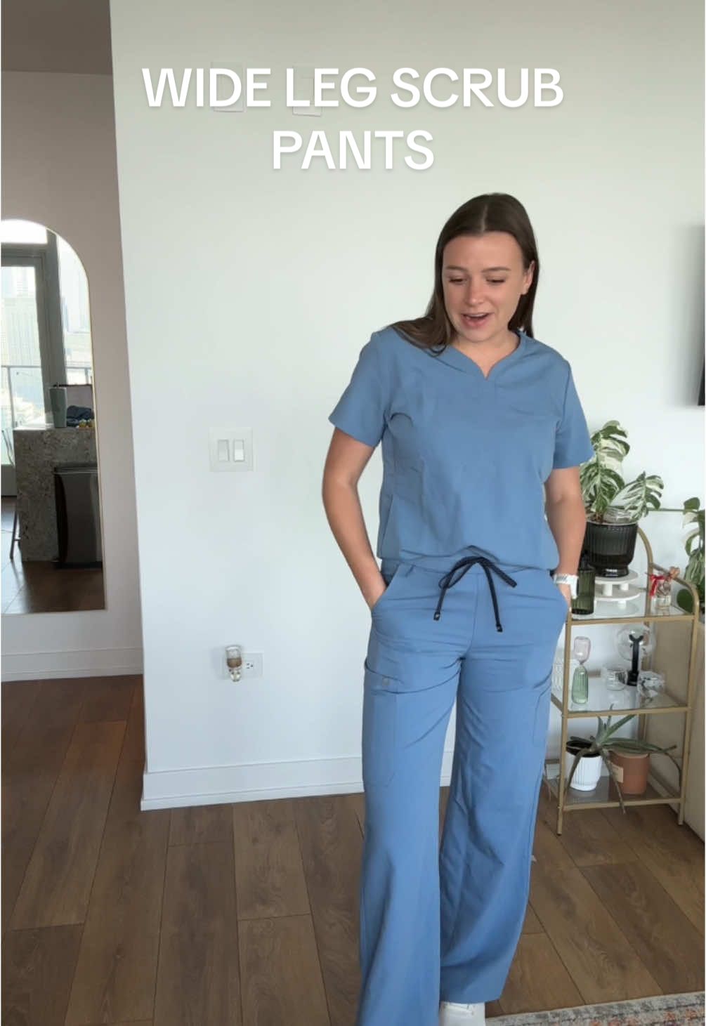 A post by @peds_slp on TikTok caption: The new @fabletics scrubs wide leg scrub pants are so perfect! #FableticsAmbassador  Also, happy (late) nurses week! For the whole month of May, you can get a $15 scrub set when you join as a new VIP member! #slpotd #scrubs #slp #slpsoftiktok #scrublife #fabletics #nurse #nursesoftiktok #nurselife 