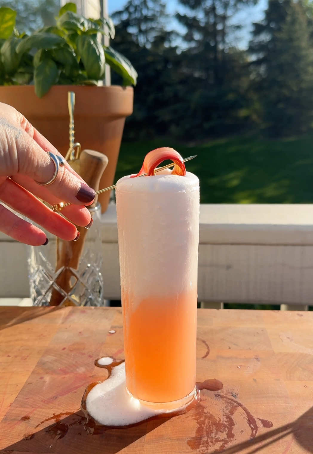 A post by @kristenfaith_eats on TikTok caption: Strawberry Rhubarb Gin Fizz 🌸🍓 Free Recipe on my Substack!💕 #happyhour #ginfizz #EasyRecipe #drinkrecipe #strawberryrecipe #rhubarb #strawberryrhubarb #yum