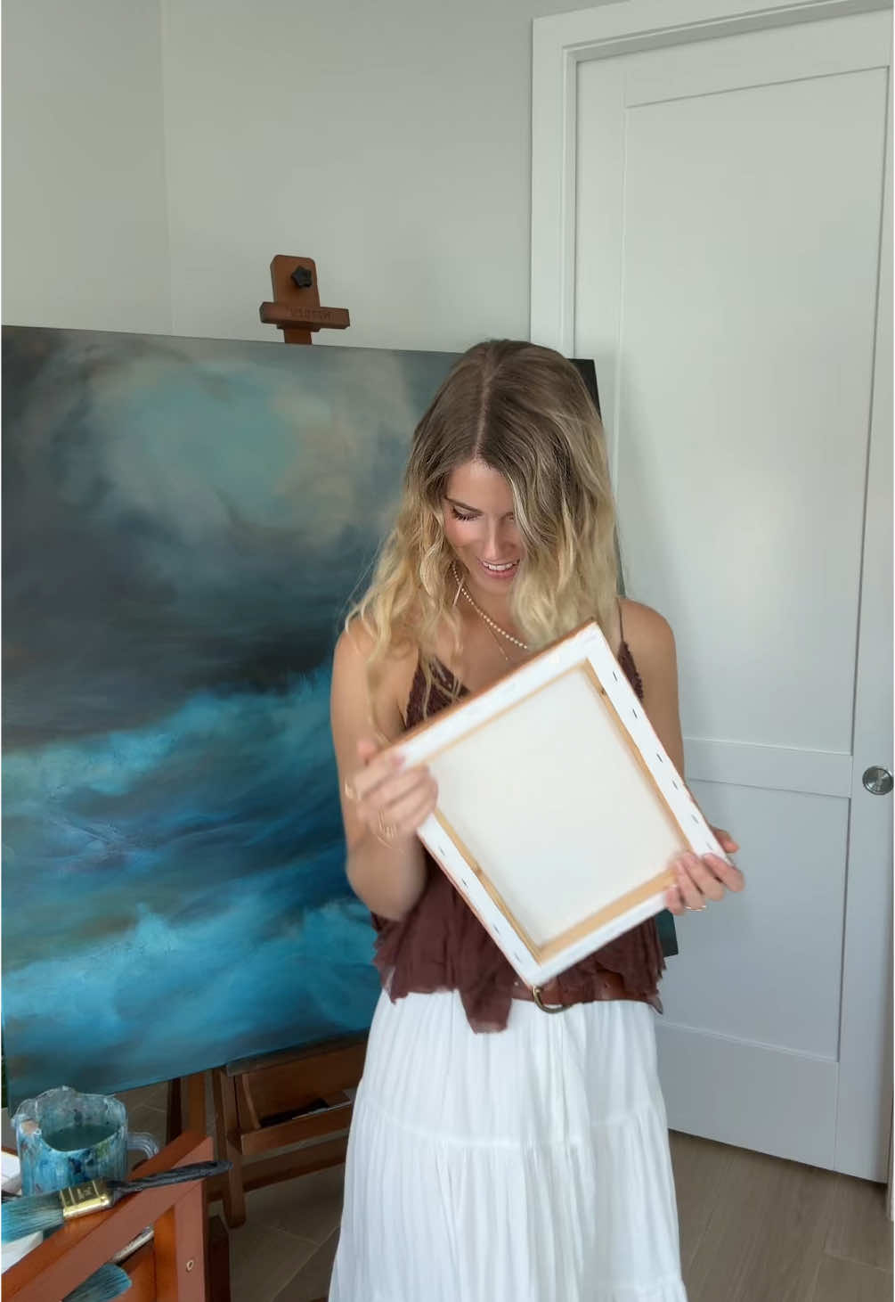 A post by @gustofwindart on TikTok caption: From canvas prep to finished piece! #acrylicpainting#oceanart#waterart  