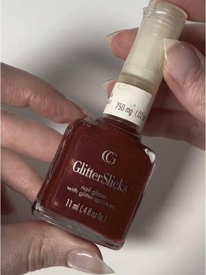 A post by @vintage_dusties on TikTok caption: Let’s swatch this Covergirl Glitterslicks in the shade Ruby Slippers 💅🏻  #vintagenailpolish #y2k #nostalgia #nostalgic #vintagecosmetics #nailtok #throwback #2000s #glitternails #nailpolish #nostalgiacore #millennial #nostalgiatok #2000snostalgia 