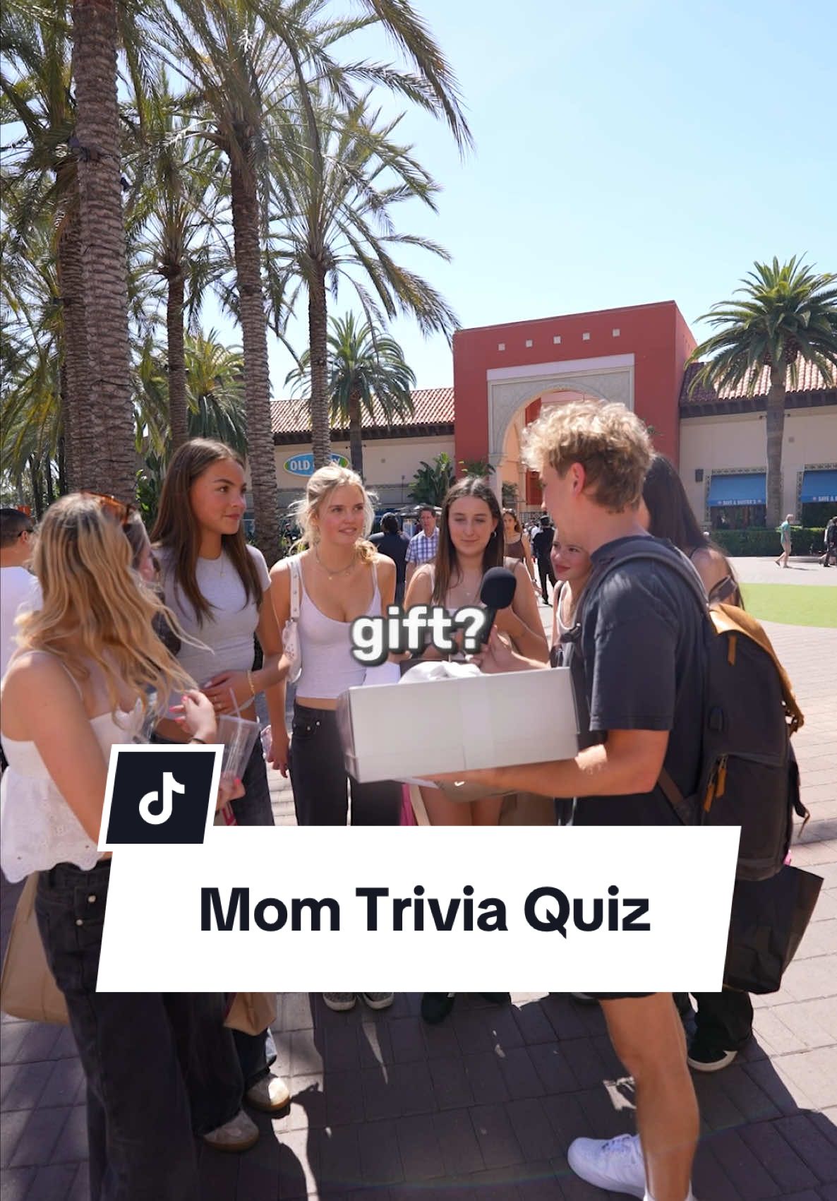 A post by @johnrusanov on TikTok caption: Would your mom be able to answer these questions? #mom #mothersday #manonthestreet #streetinterview 