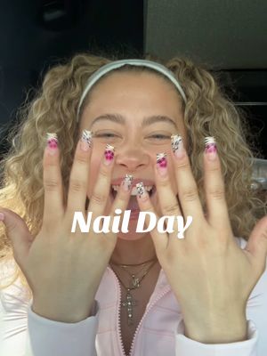 A post by @maliaelaine on TikTok caption: love these nails !! they give 2000’s baddie 🩷💅🏼👀 #nailday #nailtransition #y2knails #nailinspo #summernails 