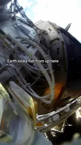 A post by @spacemanedu on TikTok caption: Earth Looks flat from up here 🤯🌎 ##space##fyp##viral##spacemanedu##astonaut##flatearth