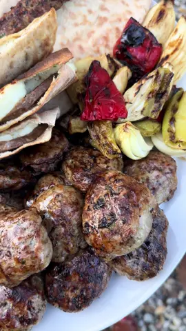 A post by @melizcooks on TikTok caption: The best kind of days 🫶🏼🧿 any questions about the recipes, pop them in the comments!  #bbq #cookingoutside #mangalkeyfi #şeftalikebabı #kebap #melizcooks #kıbrıspidesi #pitta #pittabread #hellim #halloumi #summerfood #bbqfood 