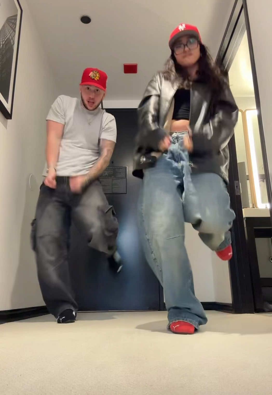 A post by @tristen.erickson3 on TikTok caption: This was hard on the carpet😂🕺🏻 W/ my girl @Vic  @Lancesavali  #fyp #parati #foryoupage #dance #devotion 