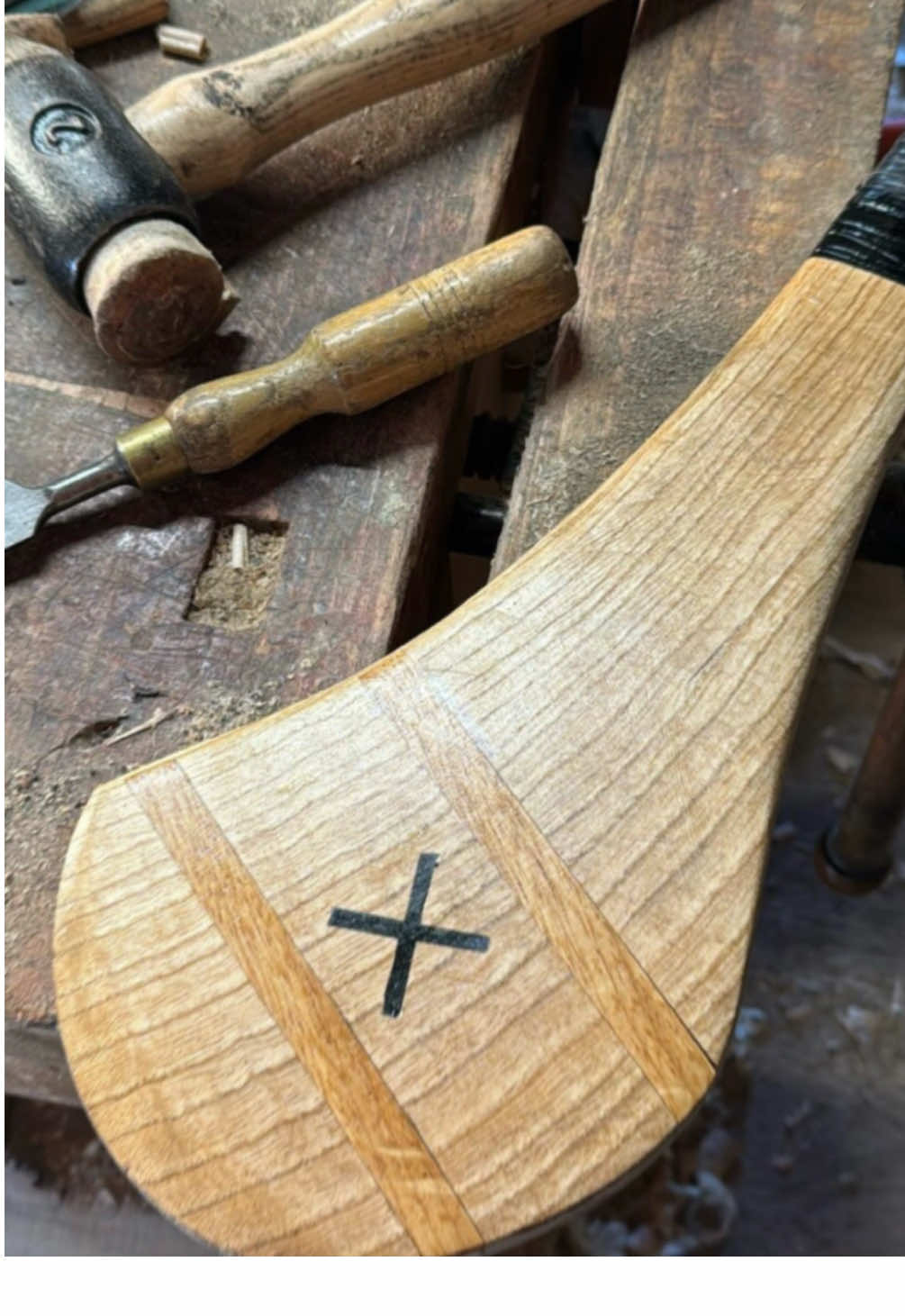A post by @pintofplane on TikTok caption: Repairing a Hurley #ireland #hurling #repair #inlay #woodwork #handtools #ash #oak 