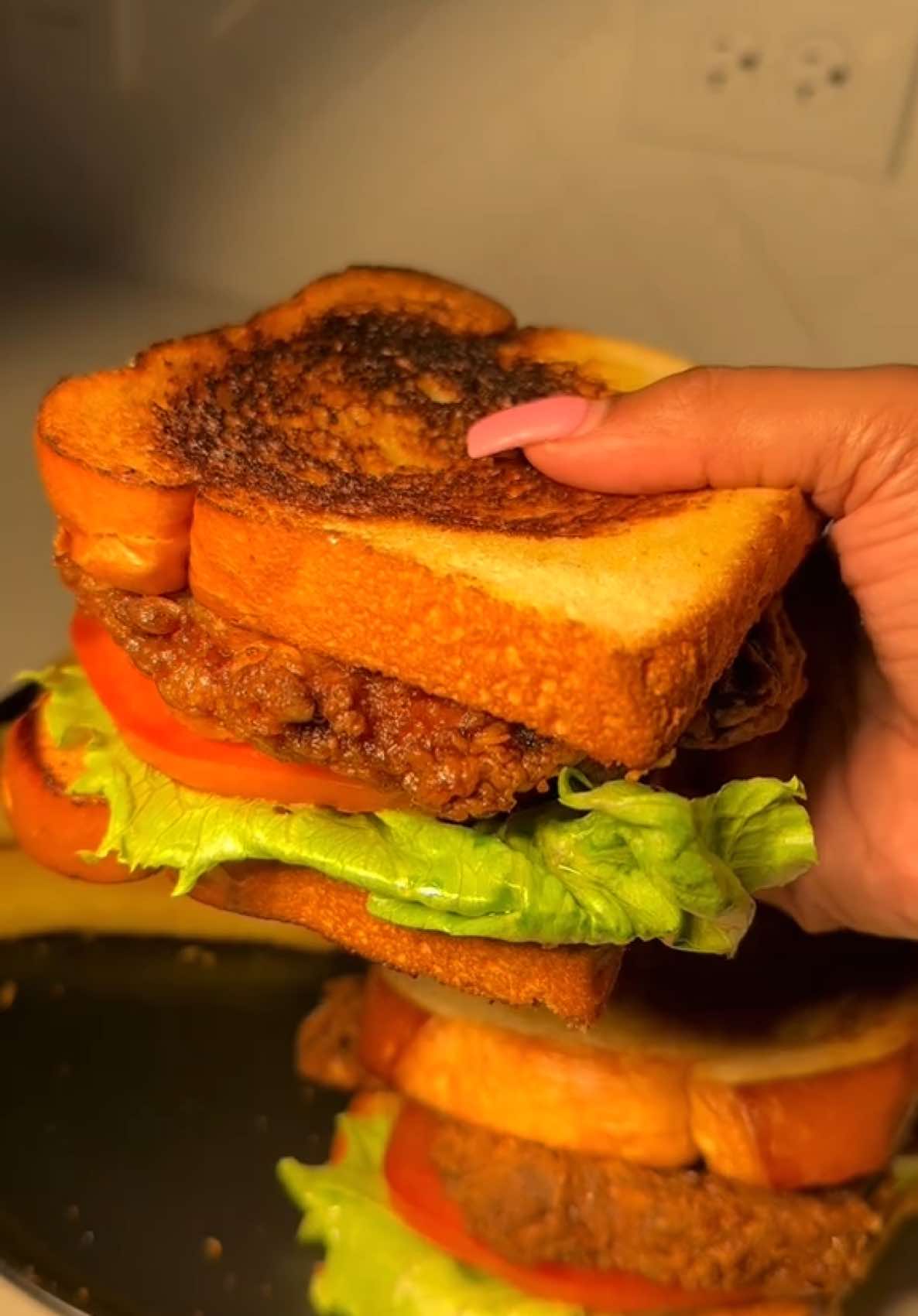 A post by @cookingwithdestiny_ on TikTok caption: Fried porkchop sandwiches 🥪 w/ @Fire & Smoke Society sweet preacher pork rub 😮‍💨 Sweet Preacher is now at Sam’s Club, Walmart, Kroger and Publix! 🫶🏼