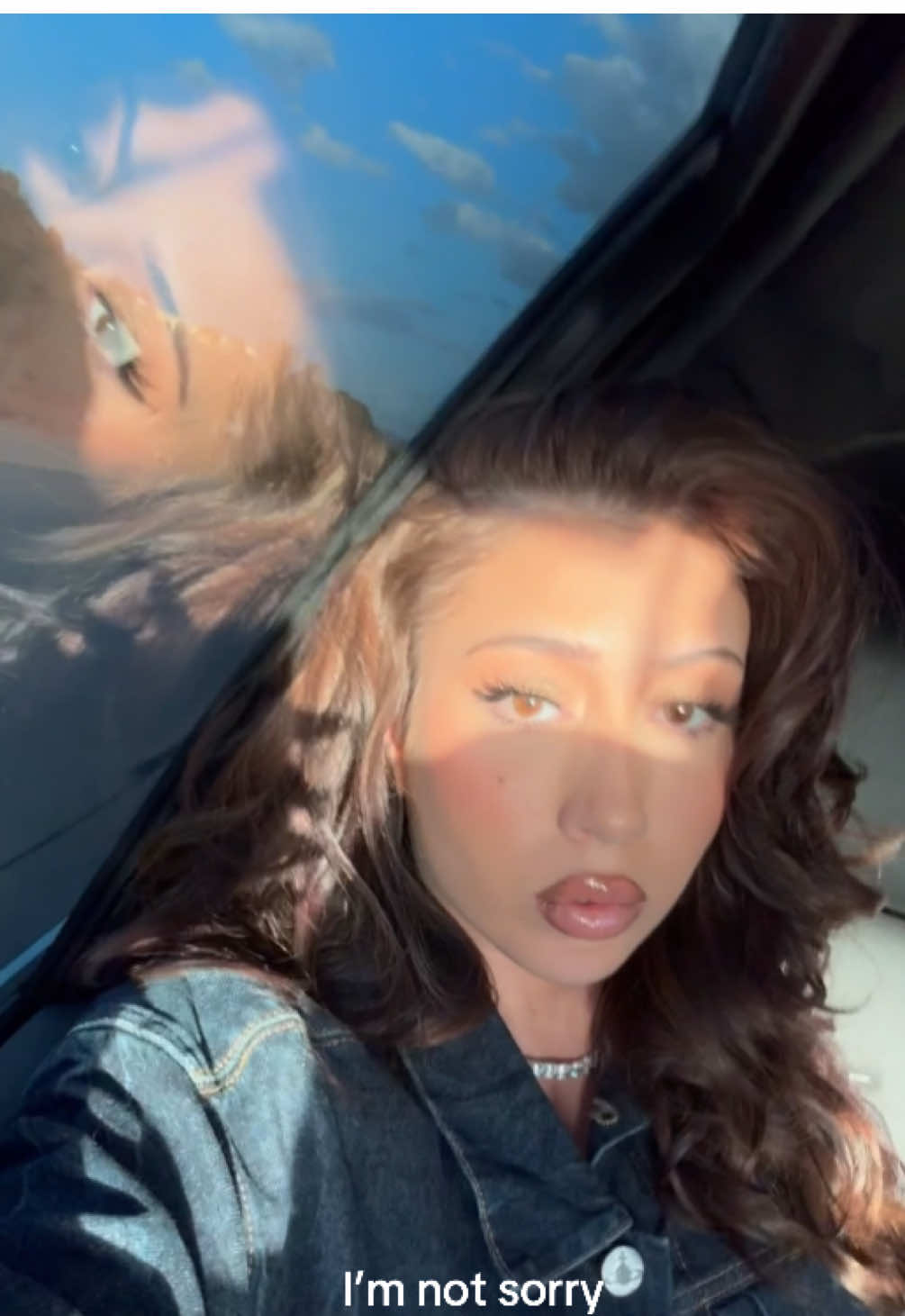 A post by @kaliuchis on TikTok caption: hope all my brown eyed girls are having a great day are your eyes orange in the sun too? 🍊