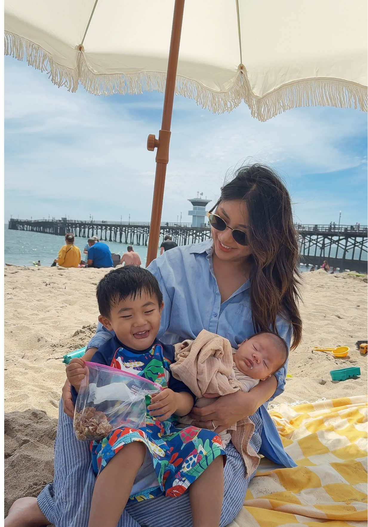 A post by @lovemicorazon on TikTok caption: Don’t want to miss a moment but it’s so tiring at the same time. 🥹 #postpartum #motherhood #momof2boys 