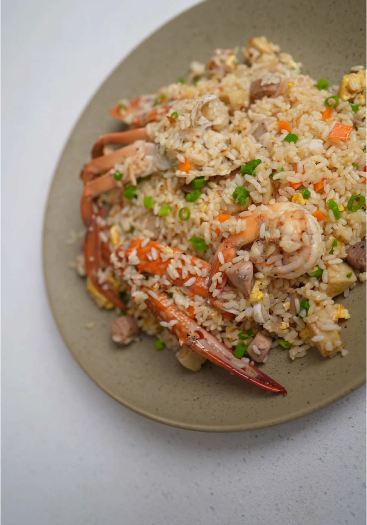 A post by @wildcookbook on TikTok caption: Simple Seafood rice 🤤 #wildcookbook 