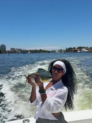 A post by @iamlexymogul on TikTok caption: DEEP SEA FISHING w the GANG! 🎣🤍 #Thingstodoinmiami #LexyMogul #Summer 