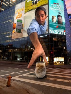 A post by @zachking on TikTok caption: Mom, I made it! I'm on a billboard! 🤩 ☕ @Nescafe USA #NescaféIcedHacks 