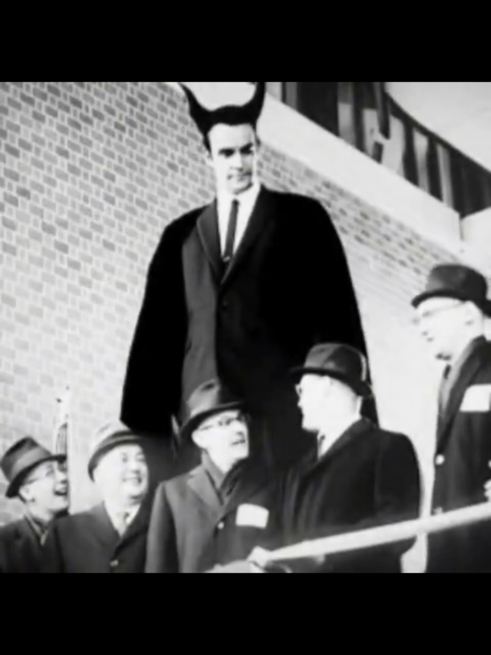 A post by @urbanlegendsfromthehood on TikTok caption: #story #government #conspiracies #history  In the early 1960s, Mayor Richard J. Daley branded the lively Harrison-Halsted neighborhood “blighted,” grabbed federal urban-renewal funds, and announced a new University of Illinois “Circle” campus; within four years bulldozers had erased some 8,000 residents and 640 mom-and-pop businesses from what had been a tightly woven Italian, Mexican, and Black community anchored by Jane Addams’s Hull-House. Promised “conservation” that locals thought meant sprucing up old homes instead became wholesale clearance, and although relocation rules said tenants should get 90 days’ notice, many recall orange X’s and eviction letters showing up barely 30–60 days before demolition—one woman told Studs Terkel she left for work and returned to find her entire block already flattened. 