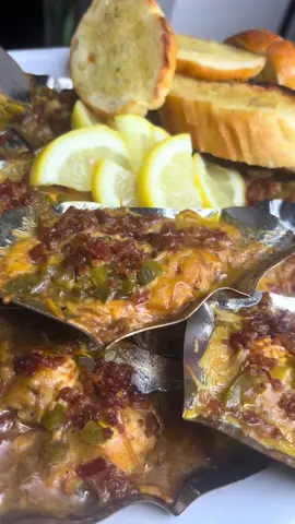 A post by @____sime on TikTok caption: Jacked Up Oysters at home #fresh #seafood #louisiana #fyp #athome #tiktok 