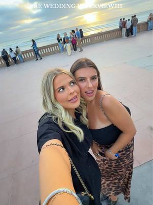 A post by @darcymcqueenyyy on TikTok caption: celebrating the ALMOST newly weds!!!🥹💍☁️ @kaeli mae #sandiego #wedding #beach #fyp #weddingseason #california #sunset #dinner #weekend 