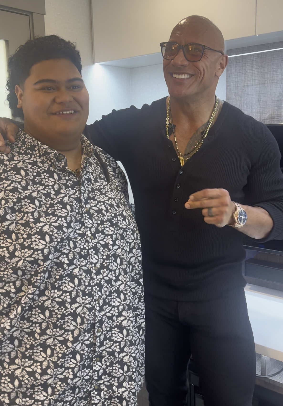 A post by @wtongi on TikTok caption: A sing-along with @The Rock wasn’t on my 2025 Bingo card. 