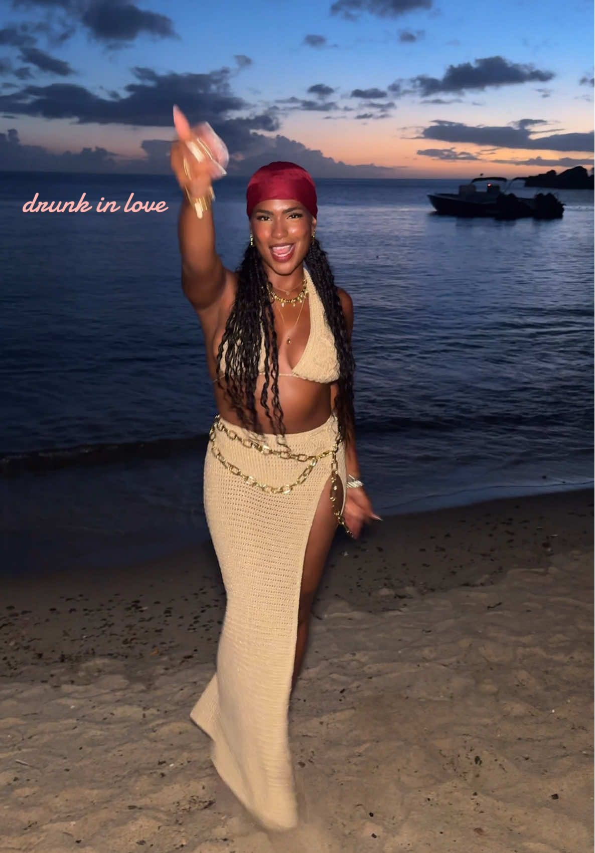 A post by @monetmcmichael on TikTok caption: had to hit this one 🍷💃🏾🥀 (just to paint the scene - dinner tonight was this GORGGG beach view… so i had run down and take advantage of the sunset and EATTT before we sat down to eat lmao. so if u saw me rolling around on the beach awkwardly tryna hit this 3 times - no you didn’t LMAO XOXO) 