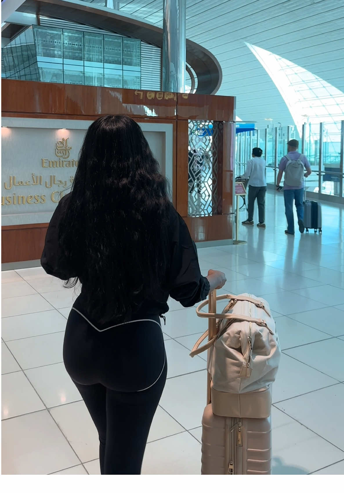 A post by @fatimabahxo on TikTok caption: fly emirates business class with me! More vlogs coming