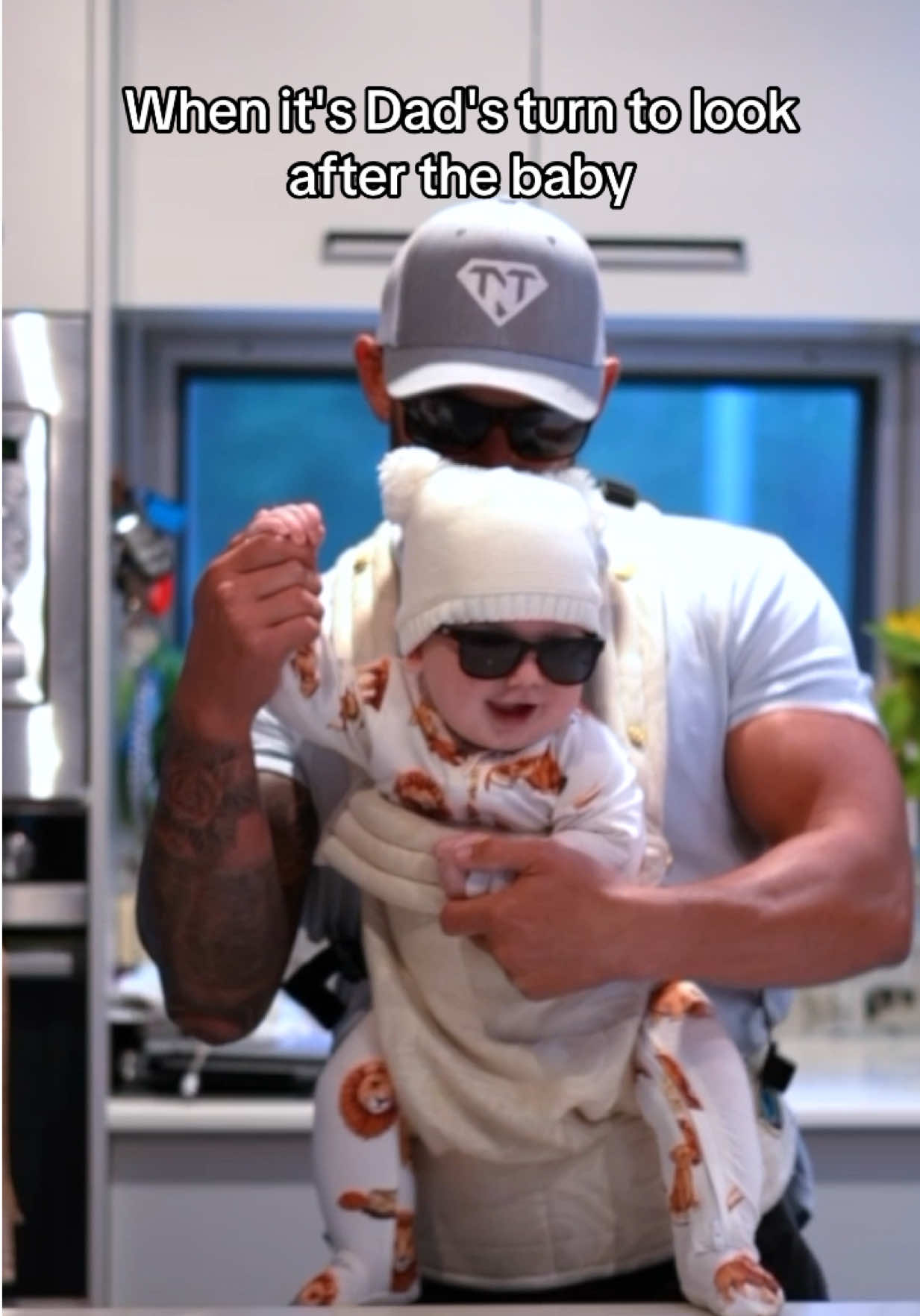 A post by @joelbushby on TikTok caption: Mums bring the milk. Dads bring the moves. Riv brings the rhythm. #dadlife #weekendvibes #daddydaycare 