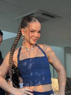 A post by @melmaia on TikTok caption: pesquisei “músicas virais”