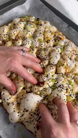 A post by @_lacebakes_ on TikTok caption: Happy World Baking Day, bread lovers! 🌎  To celebrate, please enjoy this mash up of focaccia dimpling clips. It’s my favourite step of the process when making my favourite type bread (focaccia, of course!)… What are you baking today to celebrate!?  In order of appearance: 🌶️ chili crisp oil, sesame & scallion focaccia 🤎 brown butter cinnamon roll focaccia 🌿 chimichurri focaccia (page 36 in my cookbook) 🥓 loaded baked potato focaccia (page 39 in my cookbook) 🍪 chocolate chip cookie focaccia 💫 cinnamon roll focaccia 🫒 olive tapenade focaccia 🍫 hot chocolate focaccia (page 44 in my cookbook) 🫒 classic rosemary + sea salt focaccia with green olives (page 30 in my cookbook) 🍎 apple pie focaccia  🧄 garlic butter & parmesan focaccia 🌶️ jalapeño popper focaccia 🍁 maple bacon donut focaccia 🥕 carrot cake focaccia 🌱spinach artichoke dip focaccia  🌶️ chili crisp oil, sesame & scallion focaccia 🌿 classic rosemary + sea salt focaccia (page 30 in my cookbook) 🌻 seeded wholemeal focaccia 🍢 s’mores focaccia 🍳 breakfast focaccia 🥔 potato chip focaccia 🌿 pesto parmesan focaccia 💕dimpling with my kids  #worldbakingday #bakingday #baking #focaccia 