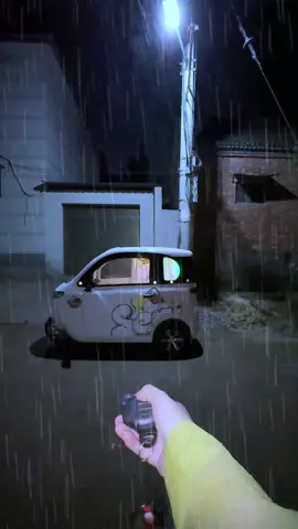 A post by @ellaonwheels_0 on TikTok caption: 🌧️It's raining again，Immersive camping in my tricycle, eating instant noodles and watching movies.Friends hurry to see it. #tricycle #minicar #campinglife #limousine #Outdoor #fyp #relax #cozyspace #asmr #rain 