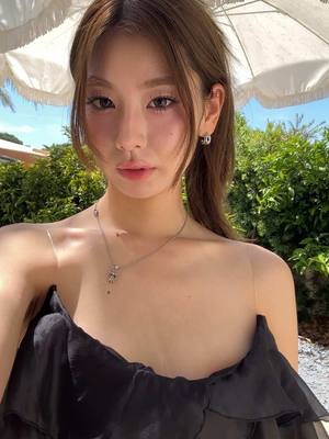 A post by @monakoaa on TikTok caption: saint tropez fit check🇫🇷🖤✨
