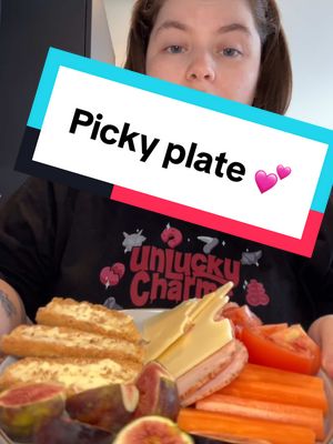 A post by @emily_loves2eat on TikTok caption: Picky plate lunch 🥕🍅🧀🍗 #fyp #foryoupagе #lunchtime #lunch #pickyplate #snackplate #carrot #tomato #chicken #cheese #butter #surgery 