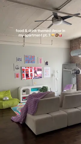 A post by @paige_mariah on TikTok caption: I don’t really know how this theme even started but I’m currently obsessed with adding new food/drink decor to my apartment! it’s just so colorful & fun 🤭  #dopaminedecor #apartmentdecor #apartmenttour #homedecor #colorfulhome #apartmentliving 
