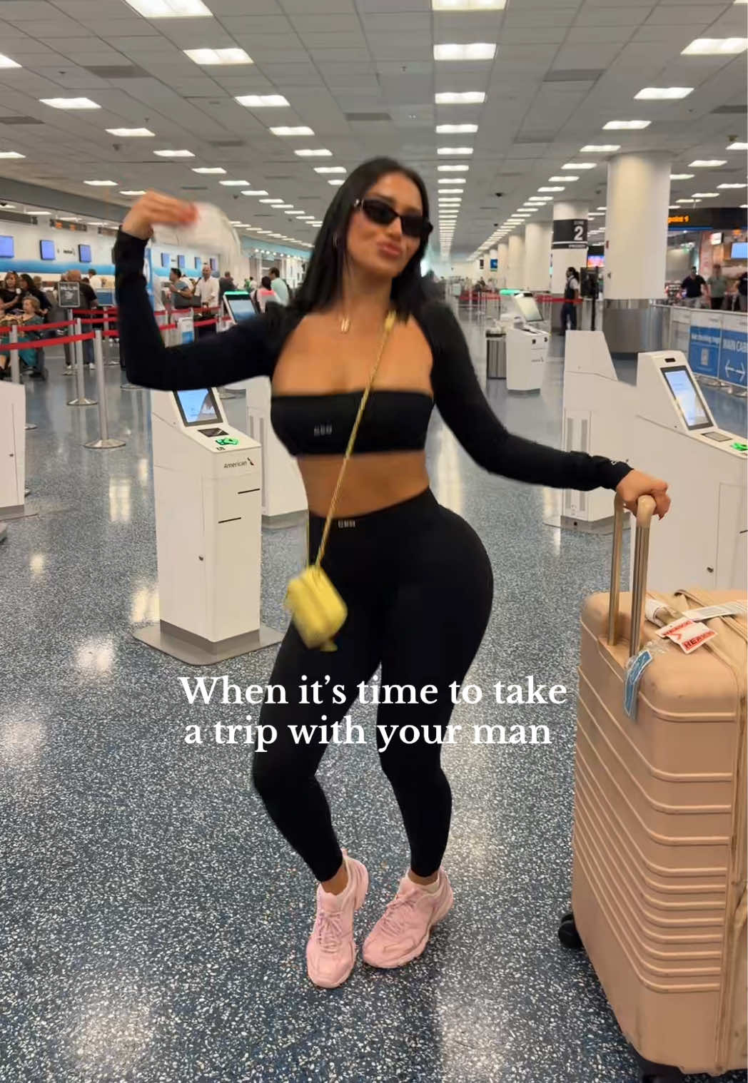 A post by @alexbravoxo on TikTok caption: This is your sign to book a trip asap ✈️ @Alexox0 @Brennen R. Davis  #fyp #explorepage #CoupleGoals #TravelCouple #RelationshipGoals #BookTheTrip #CouplesThatTravel 