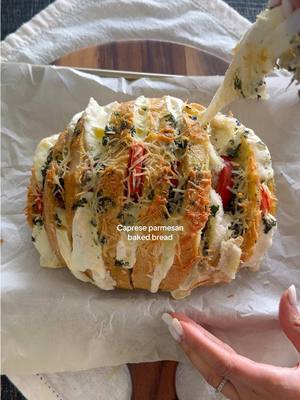 A post by @spanglishfashion on TikTok caption: Caprese parmesan baked bread 🍅🧀 #caprese  Ingredients: - Bread - 1 big tomato - 1 big ball of Mozzarella  - 1/4 cup of parmesan Pesto: - 1/2 cup extra virgin olive oil - 1 large sprig of fresh basil  - Salt and pepper Take to oven on 380 degrees for 20 mins  #garlicbread #cheesyfood #cheesy #cheesygarlicbread #homecooking #foodie #foodiegram #texascreator #spanglishfashionbreads