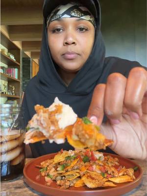 A post by @lizzo on TikTok caption: LizzoBeCookin: hangover nachos 