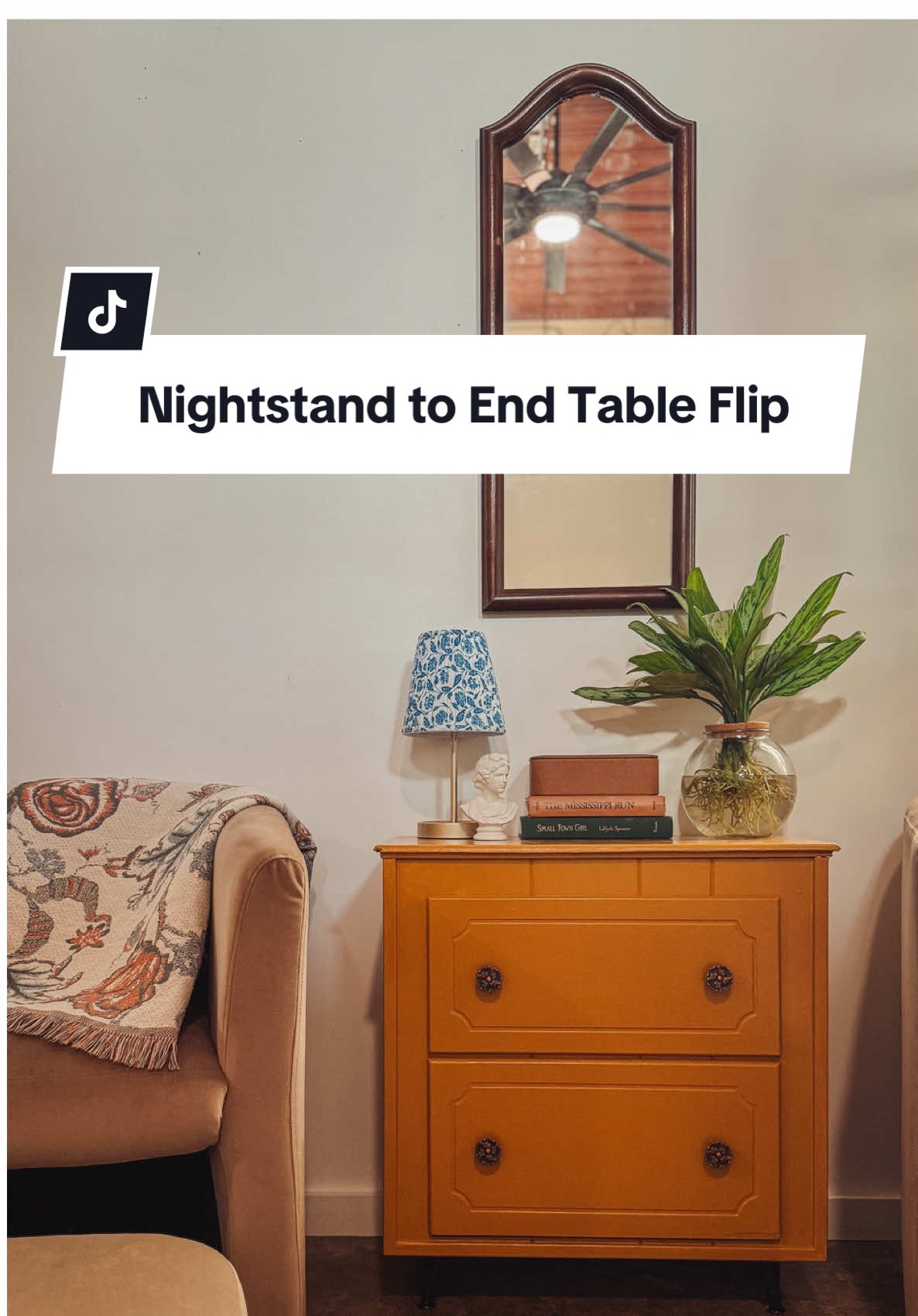 A post by @thecolorofourhome on TikTok caption: Speaking of budget-friendly furniture flips… here’s a quick side quest while we gear up for more speakeasy content (promise it’s coming soon!). I snagged this old nightstand from some neighbors who were moving—for just $10. Gave it a fresh coat of the same paint I used on the fireplace, and boom—brand new end table vibes on a teeny tiny budget. Total win. 💯 #furnitureflip #furnituremakeover #endtable #livingroominspo #budgetdiy 