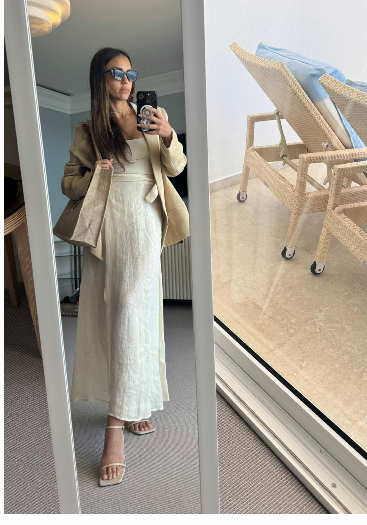 A post by @jessicaalba on TikTok caption: #GRWM for the pool 🤍 