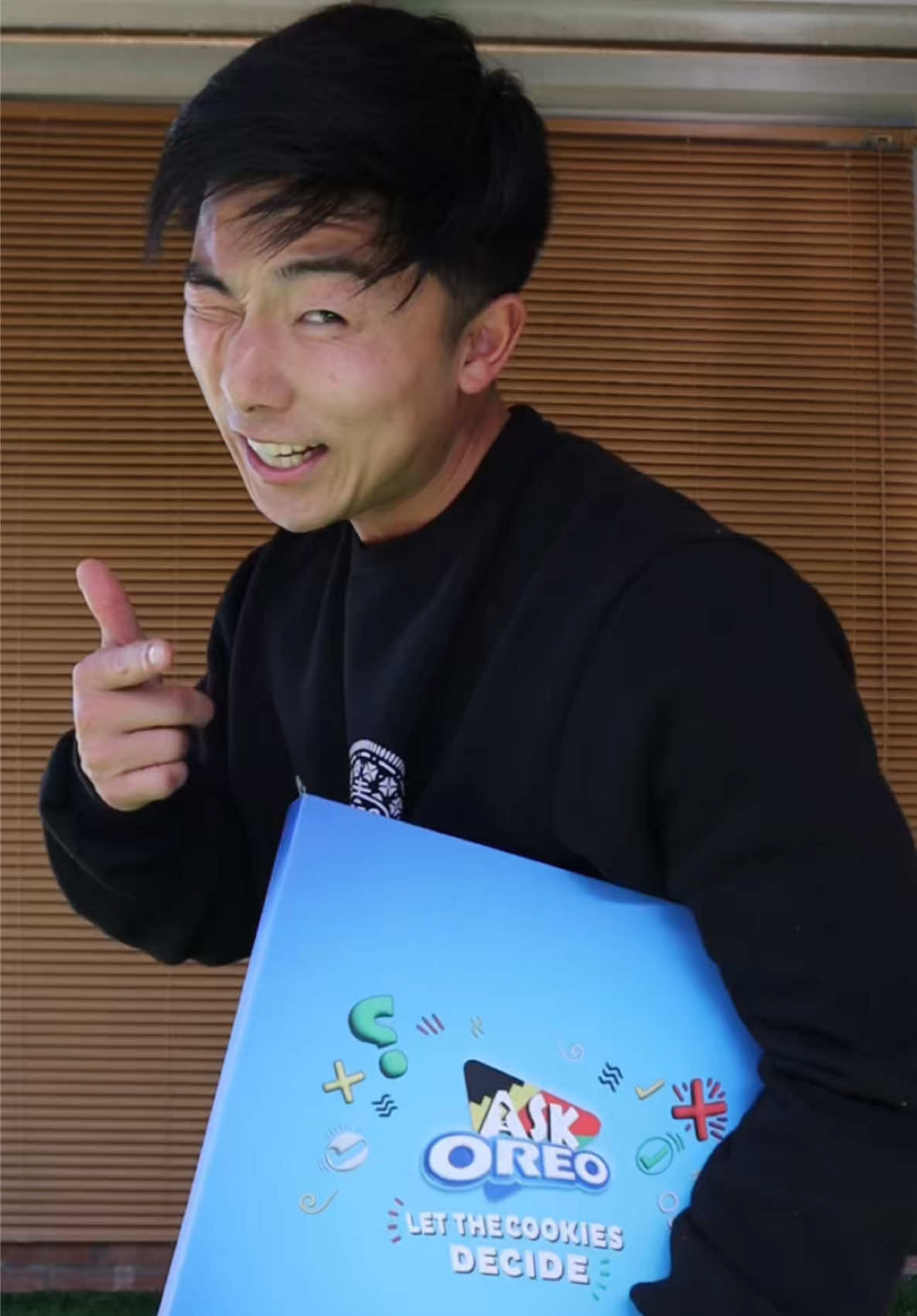 A post by @chadjones957 on TikTok caption: GRWM for family games night 😎 BUT I’m letting the @Oreo  cookie decide my fit 🤪😝 Grab your pack of limited edition #AskOreo and #LetTheCookieDecide #ad #Sponsored