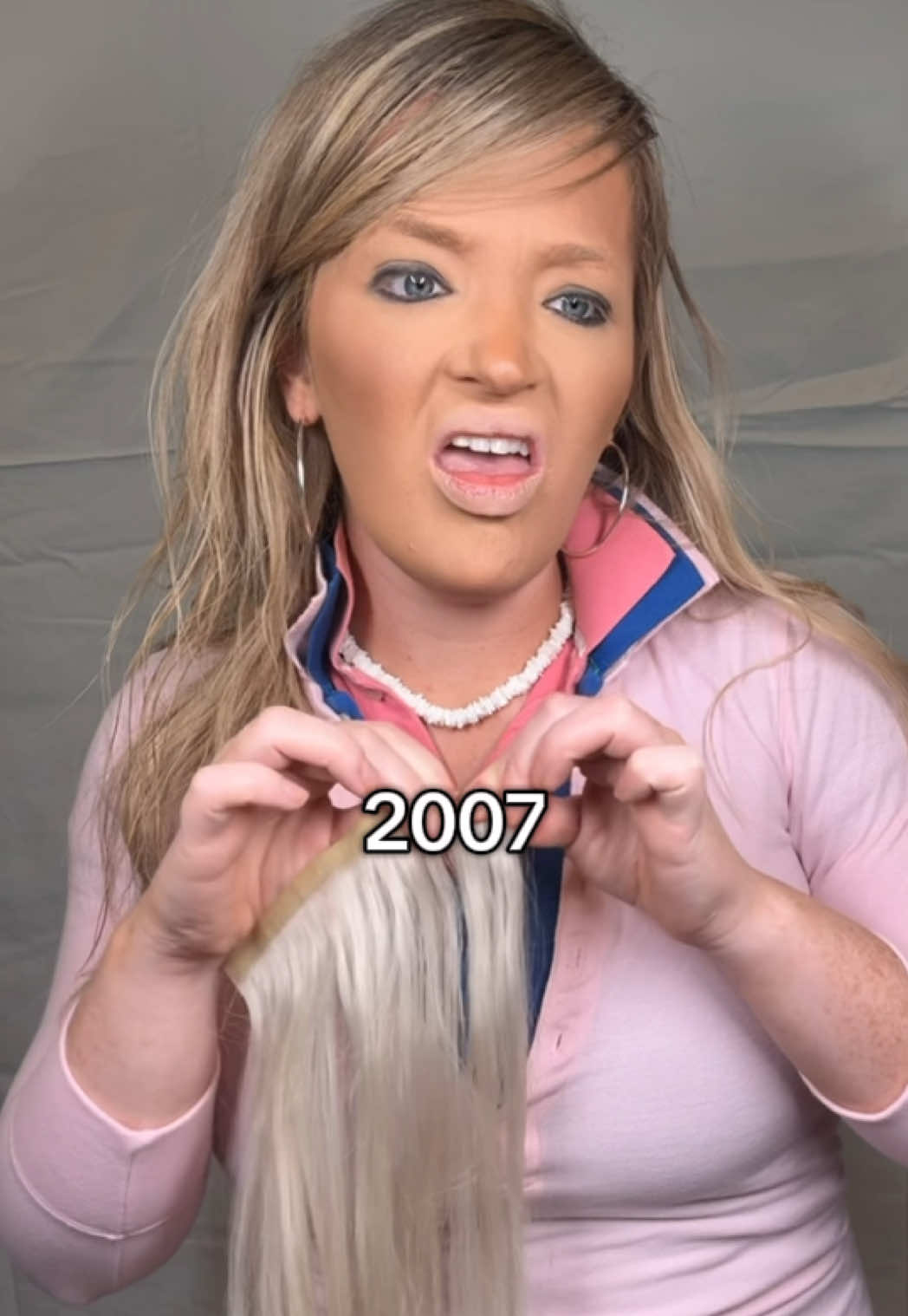 A post by @isabelclanc on TikTok caption: 2007 hair extensions could never @The Wild Salon #nostalgia #millennial #2000s #2007 #hairextensions 
